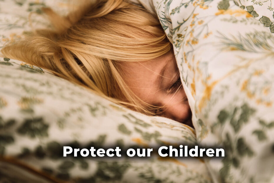 Blonde haired child lying on floral pillow. Overlaid words read: protect our children