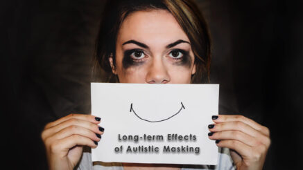 A white woman with sloppy makeup holding a white card with a smile drawn on it in front of her face. It also reads: long-term effects of autistic masking